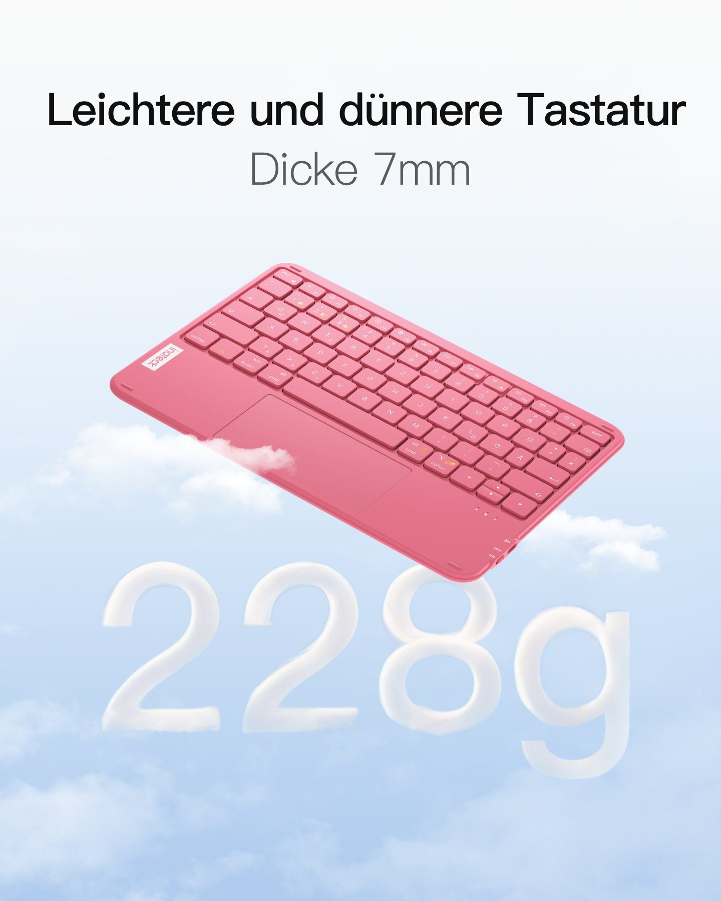 Eine pinke Tastatur mit Touchpad schwebt vor einem blauen Himmel mit Wolken.
