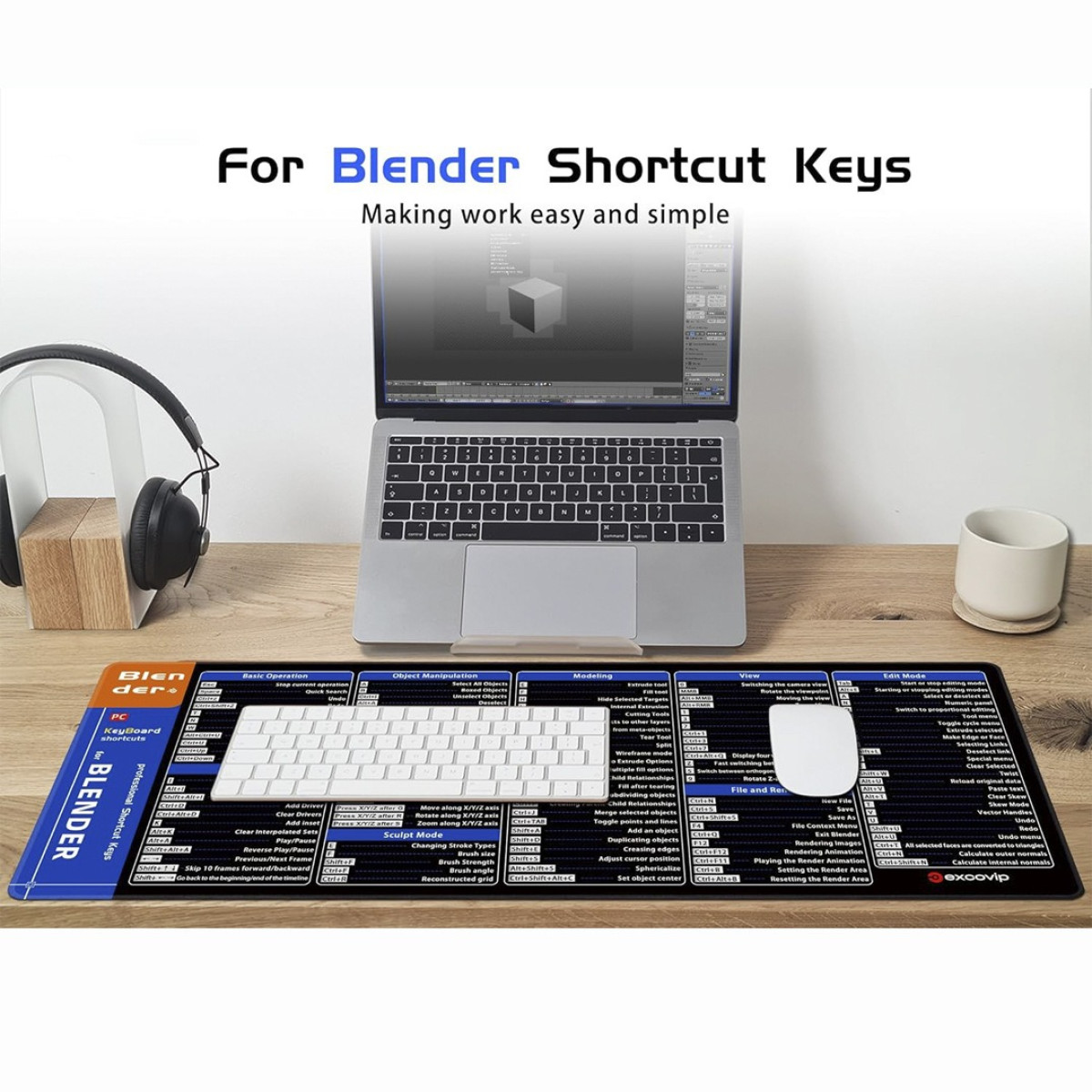 Eine Tastatur-Layout-Matte für Blender-Tastenkürzel, die auf einem Schreibtisch mit einem Laptop und Kopfhörern liegt.