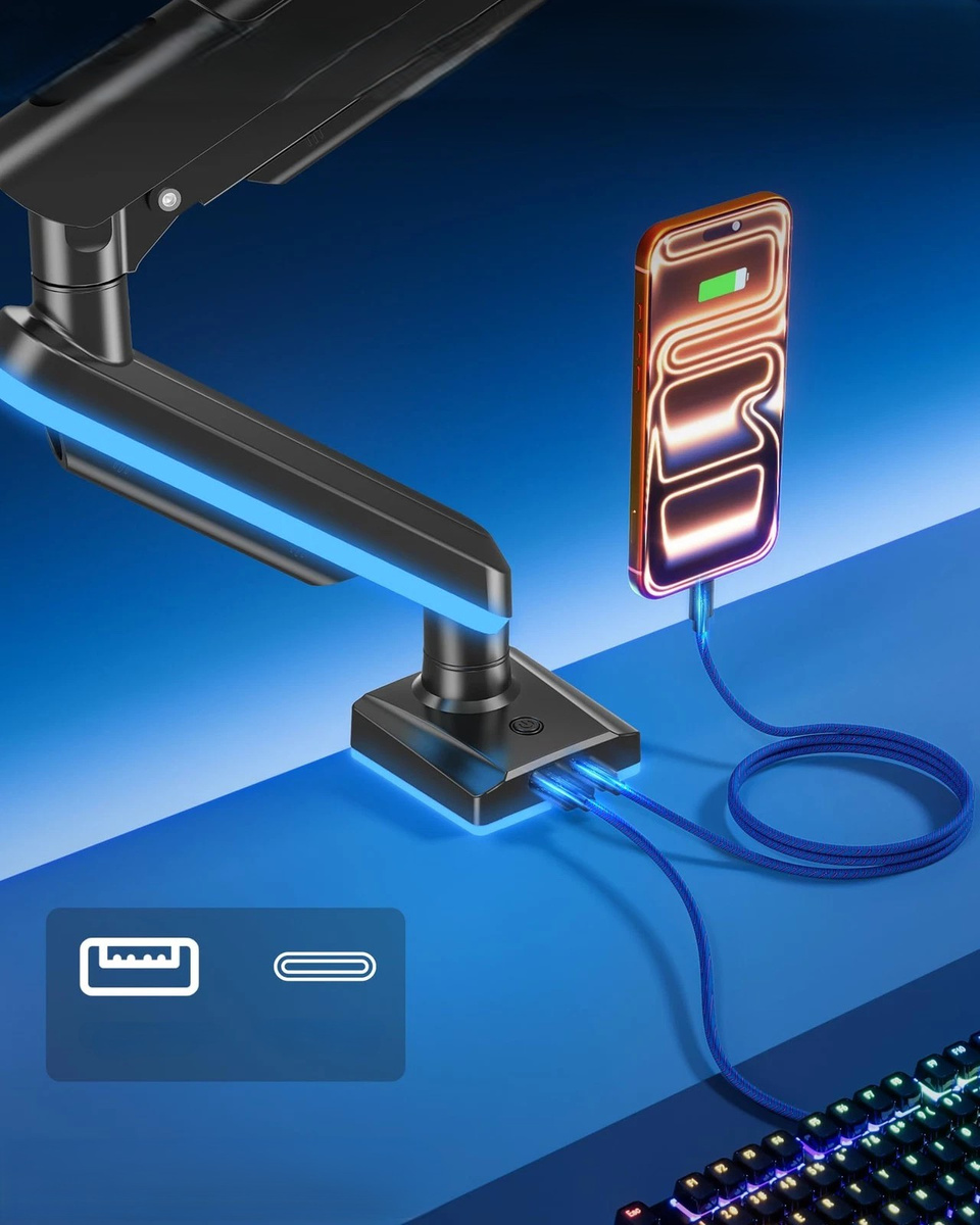 Czarny wysięgnik monitora z niebieskim światłem ładuje telefon. Widoczne ikony USB.
