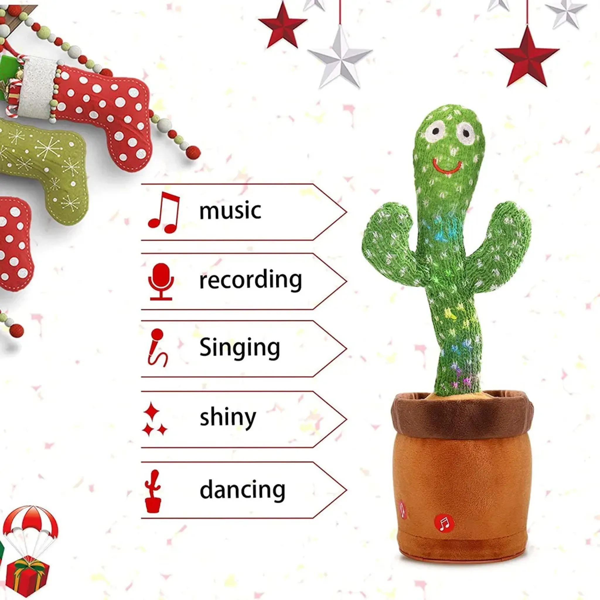 Ein grüner Kaktus mit einem Gesicht in einem Topf, umgeben von Weihnachtsschmuck.