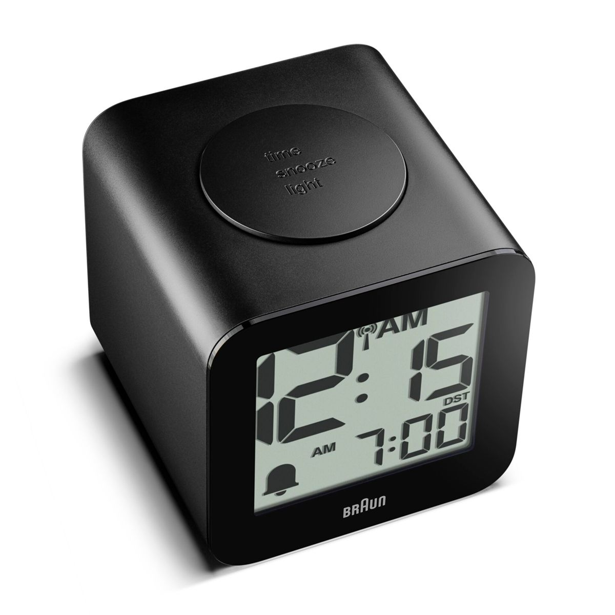 Ein schwarzer digitaler Wecker von Braun zeigt 12:15 AM und 7:00 DST an.