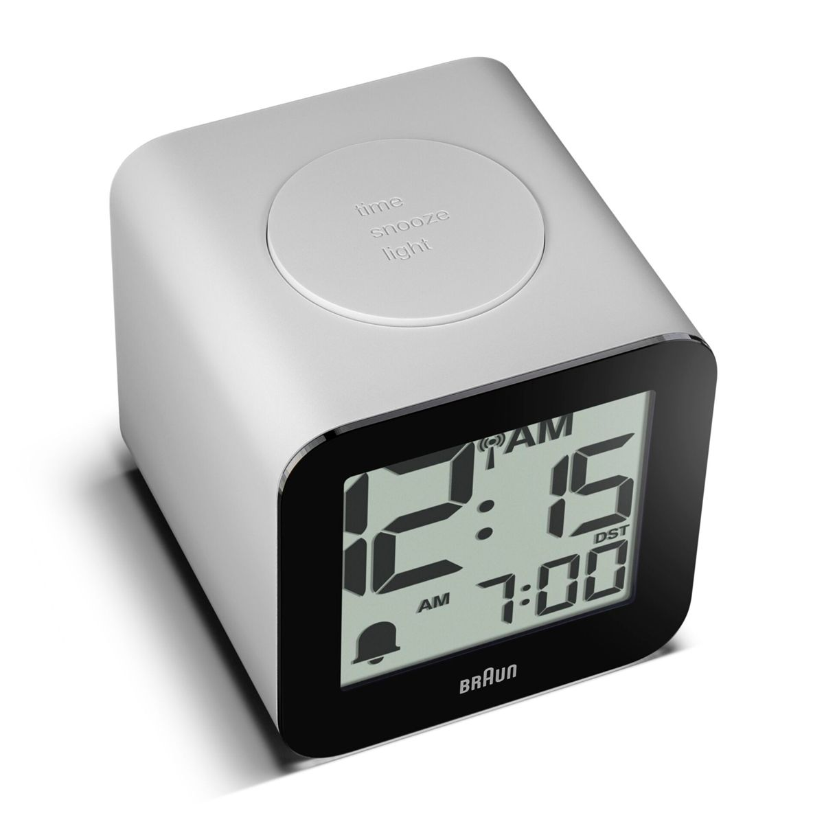 Ein moderner digitaler Wecker zeigt 12:15 AM und 7:00 DST an.