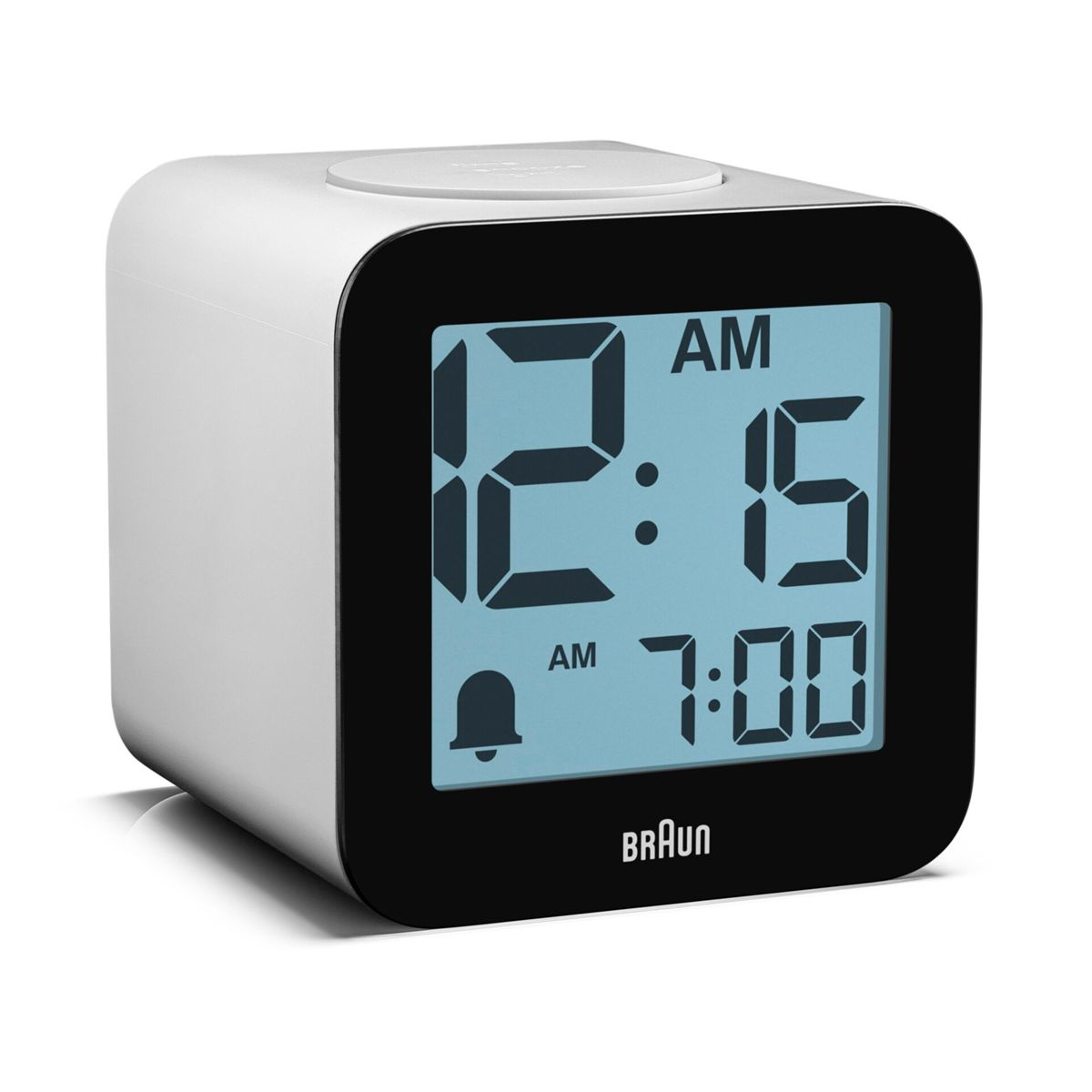 Ein weißer digitaler Wecker zeigt 12:15 AM und 7:00 AM an.