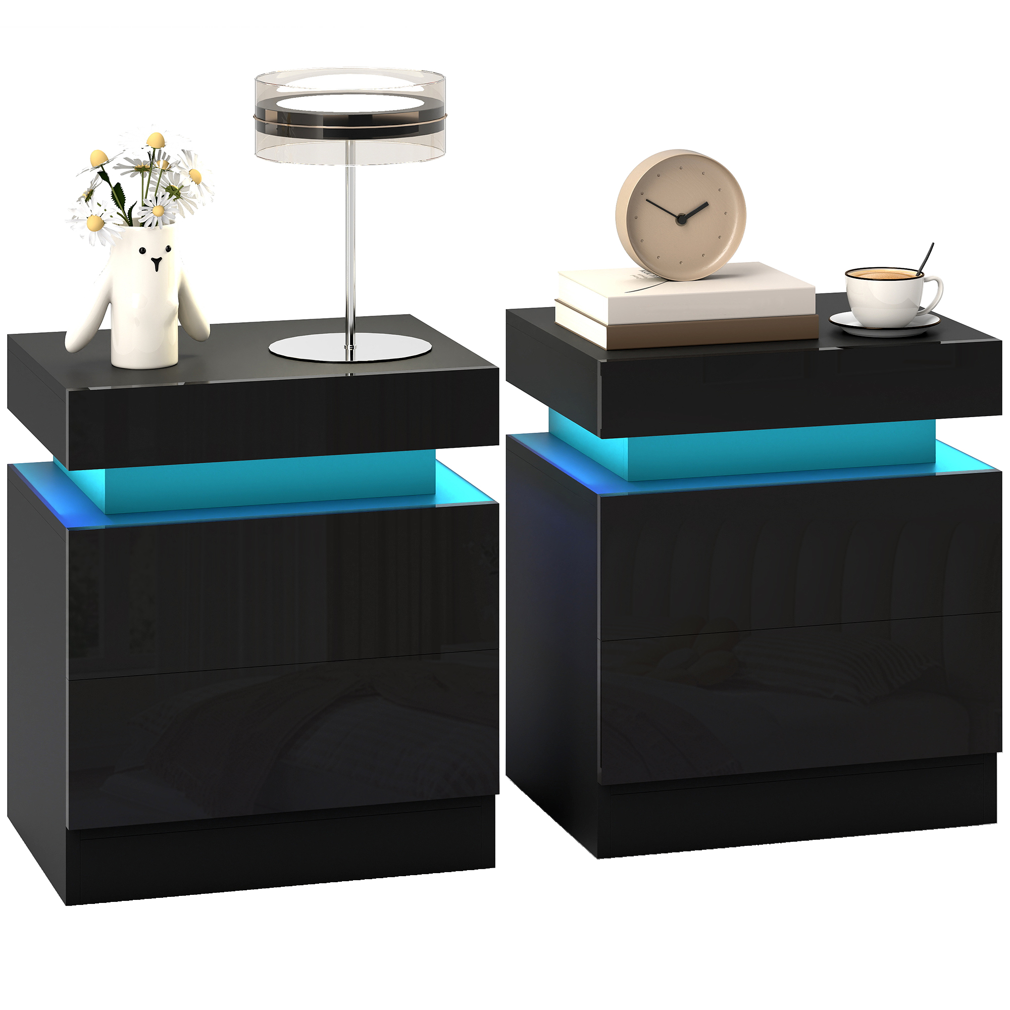 Due comodini neri con illuminazione a LED blu, uno con vaso e fiori, l'altro libri e caffè.