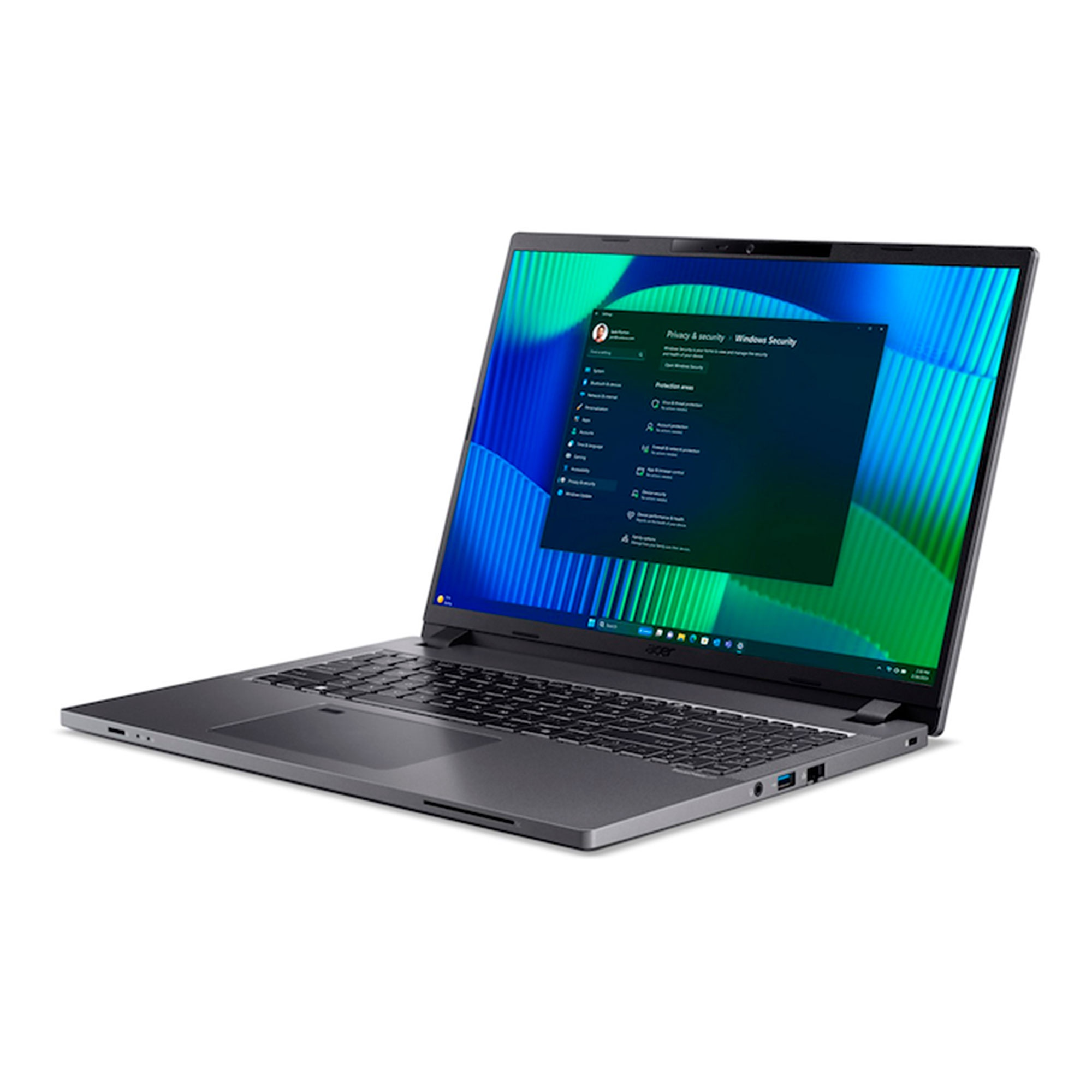Un portátil gris abierto sobre fondo blanco mostrando la pantalla de seguridad de Windows.