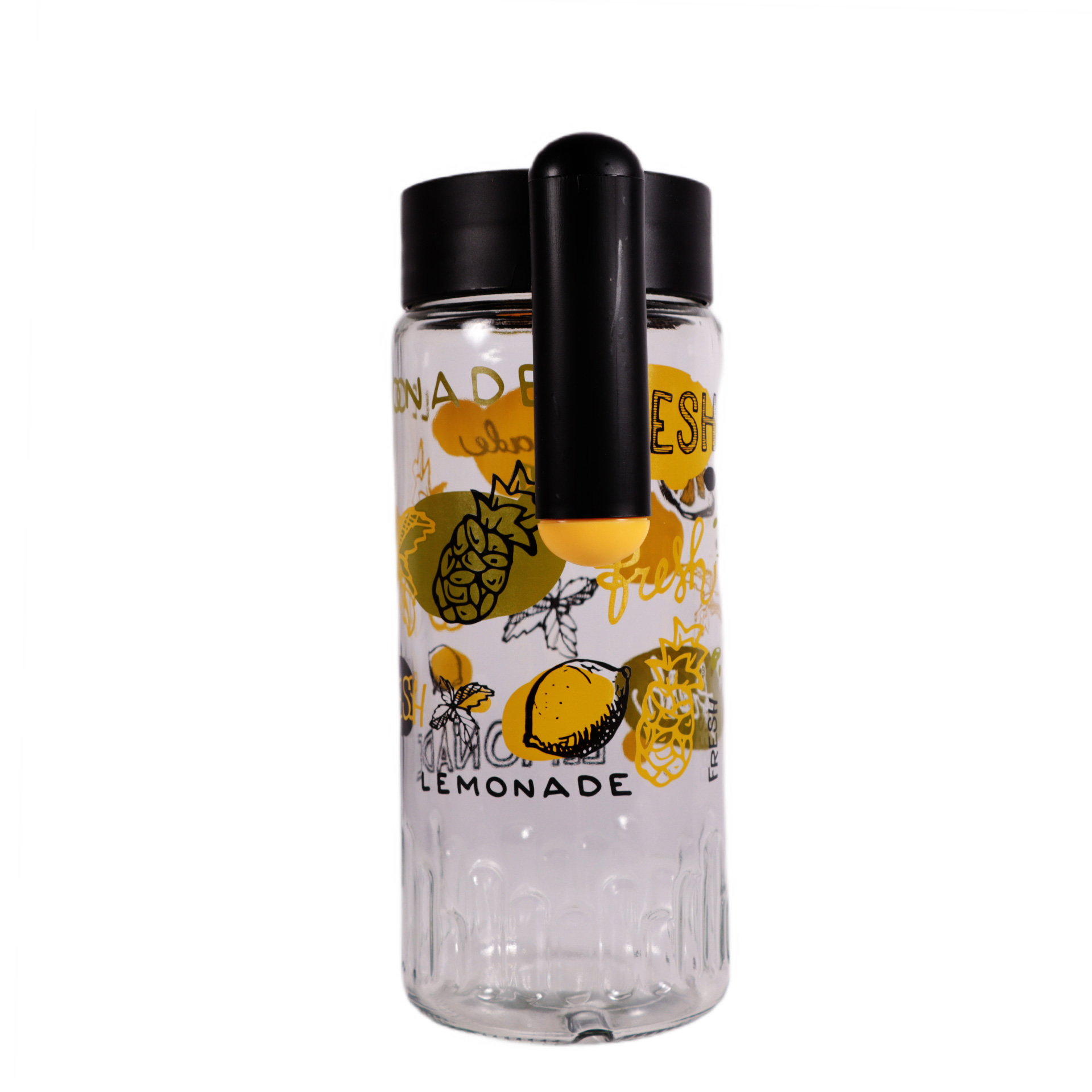 Siyah kapaklı ve kulplu cam sürahi, limonlarla süslenmiş.