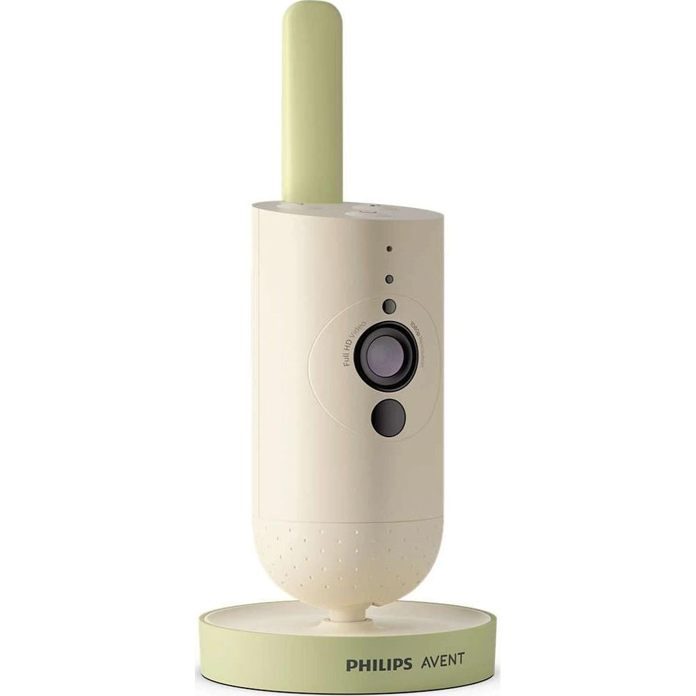 Un baby monitor color crema con antenna e base verdi.