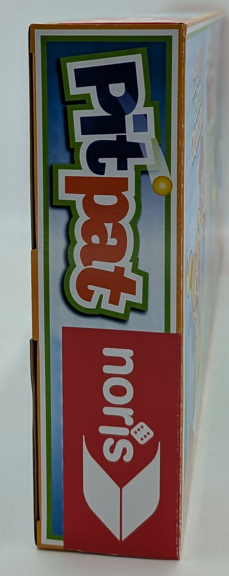 Die Seite einer Spielschachtel mit dem Titel 'Pit pat' und dem Noris-Logo.