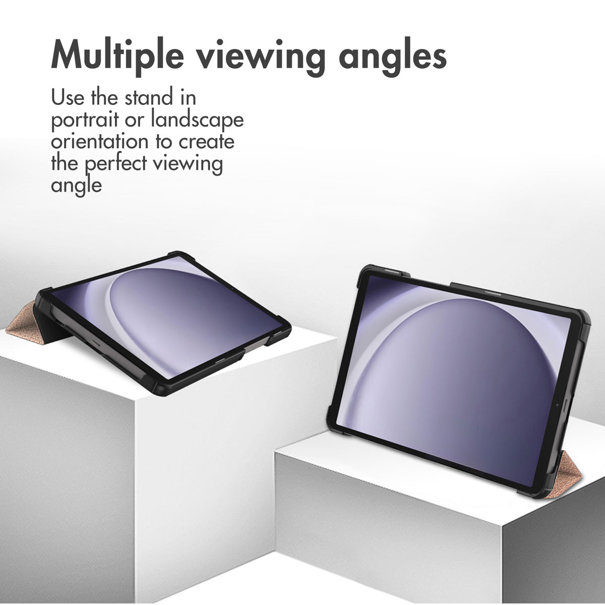 Two black tablets with stands on white blocks, showing different viewing angles.