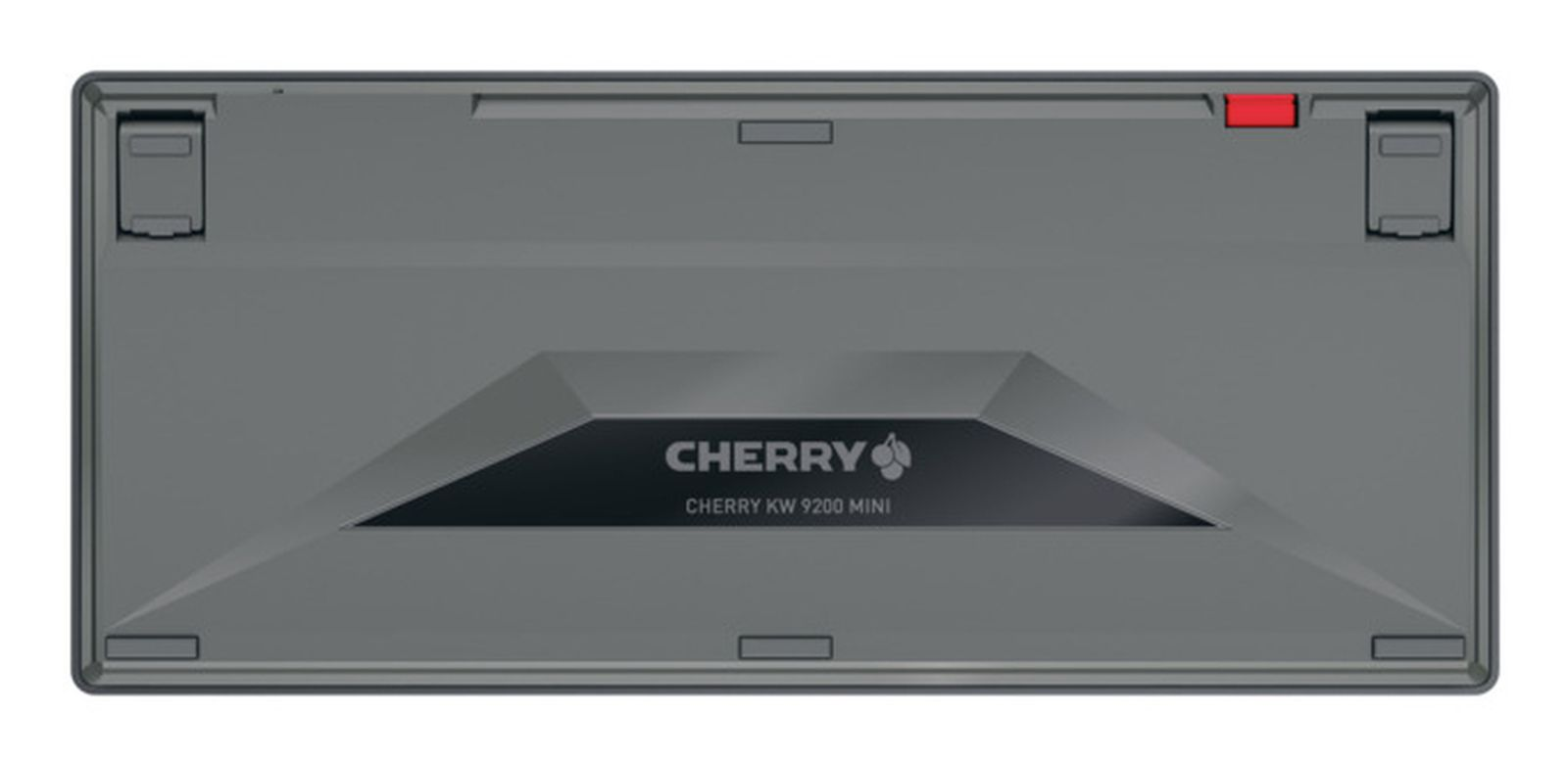 Parte inferior de un teclado Cherry KW 9200 Mini gris con logo.