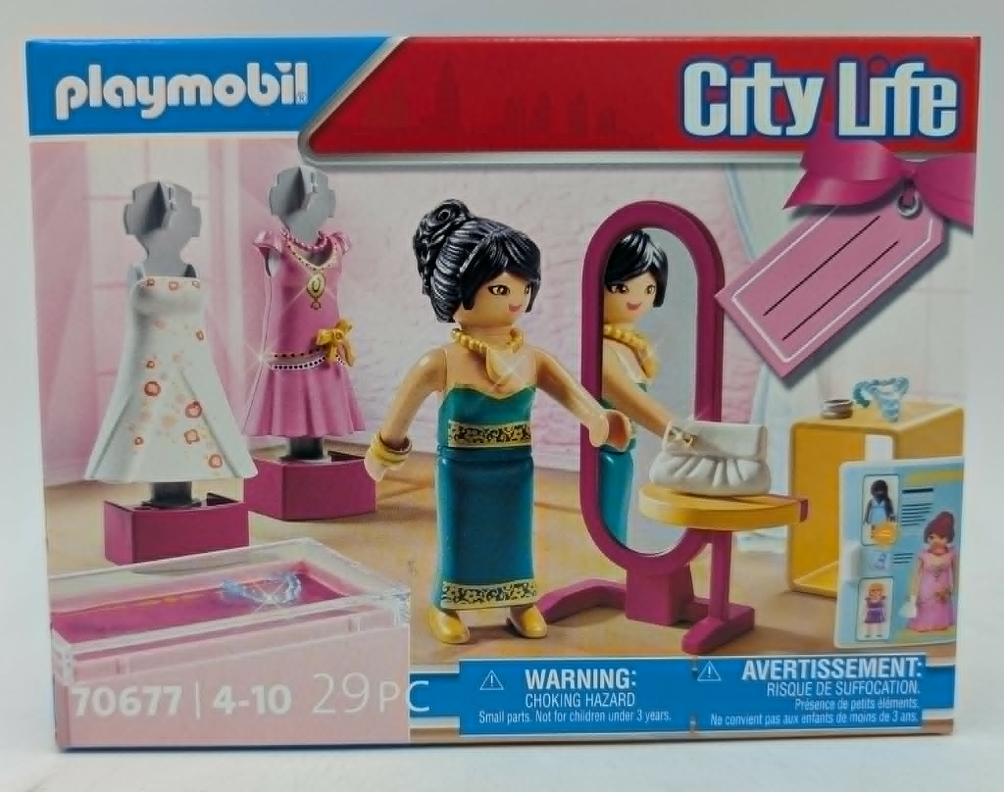 Playmobil City Life mit zwei Kleiderständern, einer Puppe und einem Spiegel.