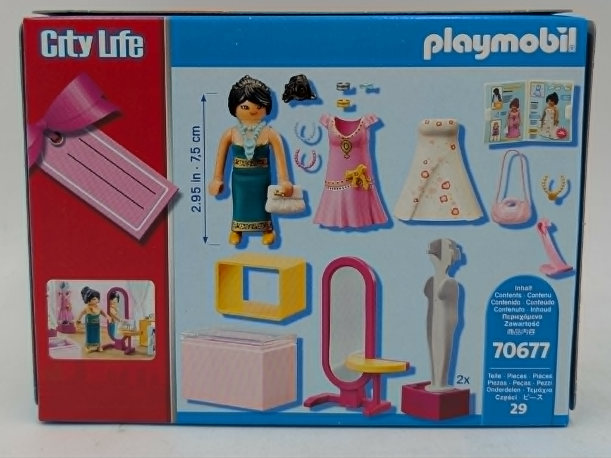 Playmobil-Box mit Puppe, Kleidern, Accessoires, Schminktisch und mehr.