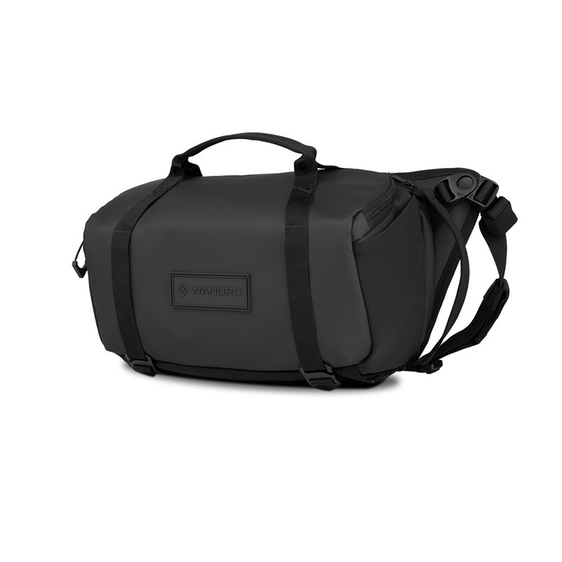 A black, rectangular bag with two handles and a strap.