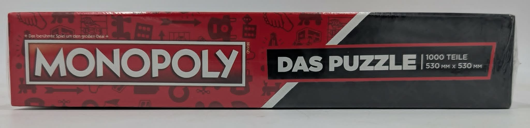 Monopoly-Puzzle-Verpackung mit Logo und 1000 Teilen.