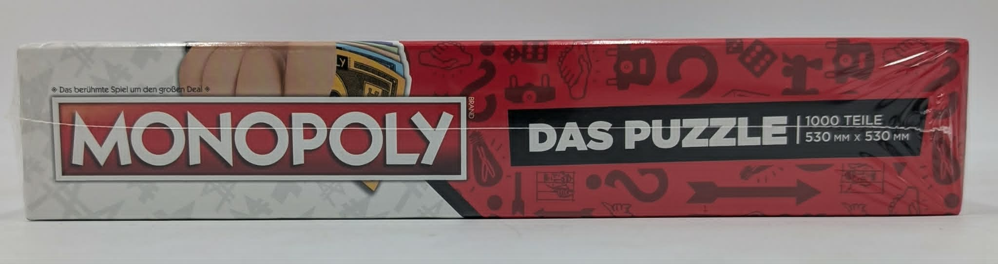 Monopoly Puzzle Box: Roter Hintergrund mit Silhouetten, Monopoly Logo, 1000 Teile.