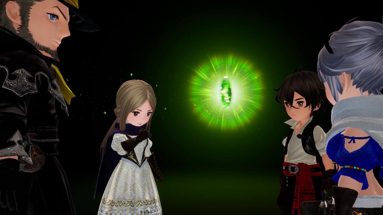 Quattro personaggi guardano un oggetto verde brillante al centro.