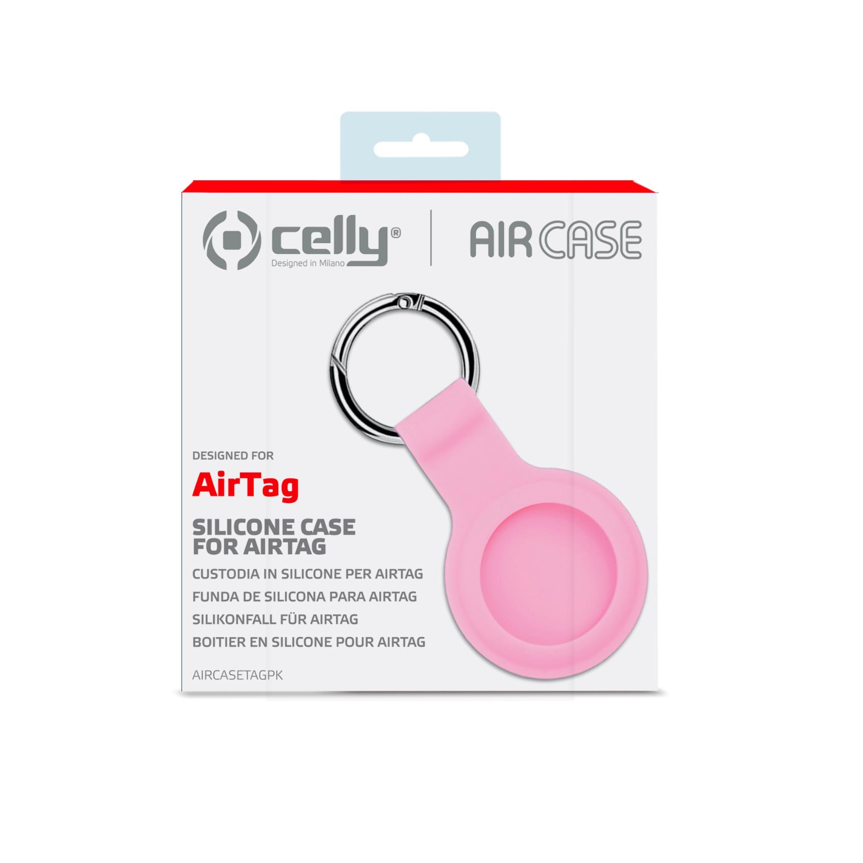 Una custodia in silicone rosa per AirTag con portachiavi sulla confezione.