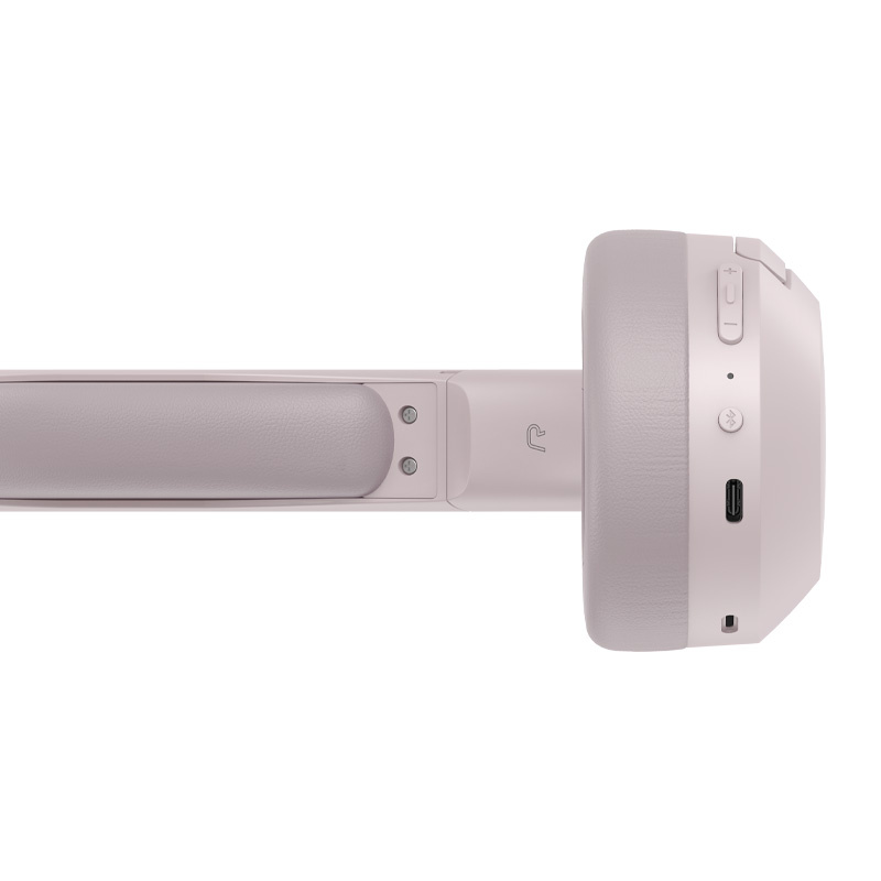 Zbliżenie jasnoróżowych słuchawek nausznych, z przyciskami i portem USB-C.