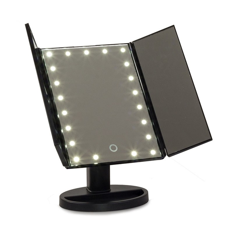 Uno specchio per il trucco nero con luci su un supporto.