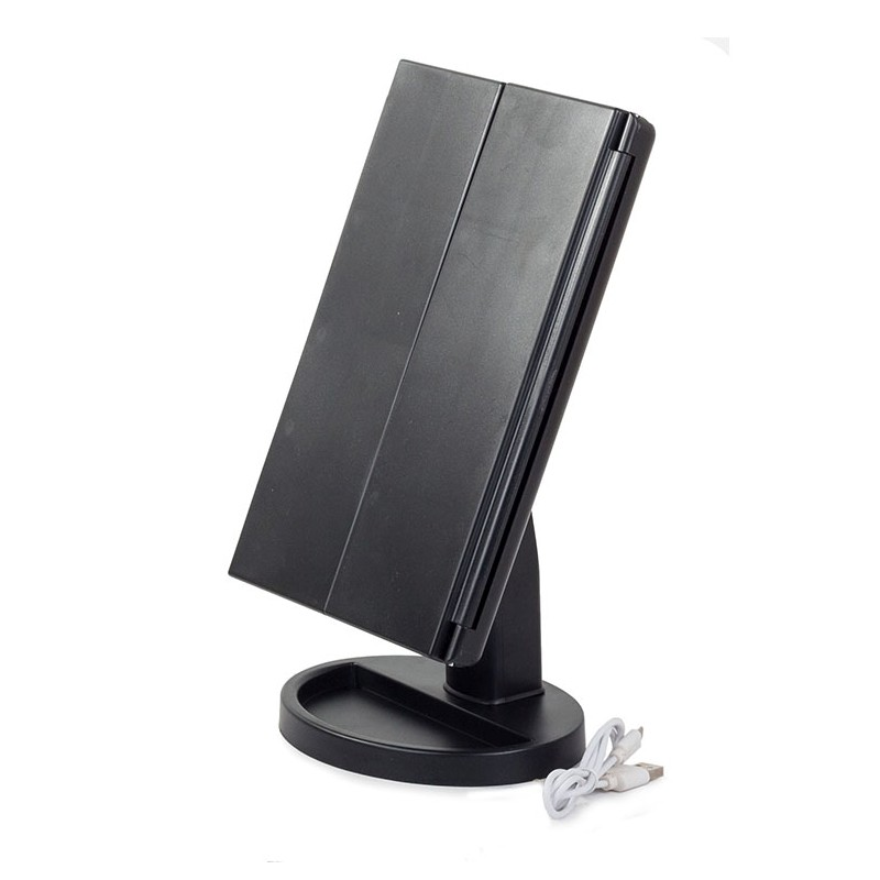 Specchio per trucco nero illuminato con cavo USB su sfondo bianco.