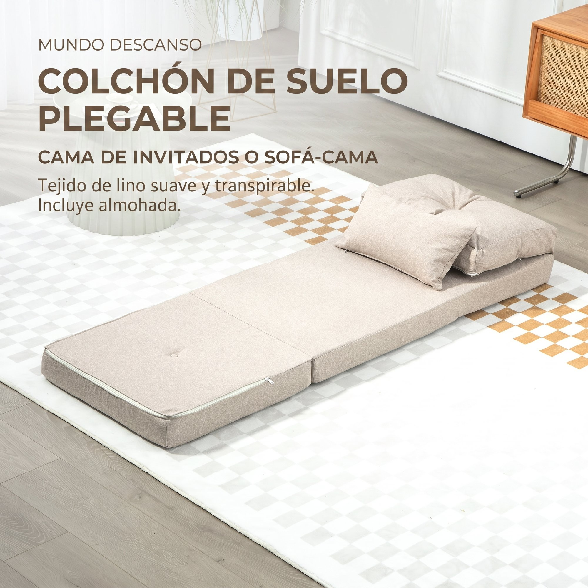 Un colchón plegable beige para suelo con dos almohadas sobre una alfombra.
