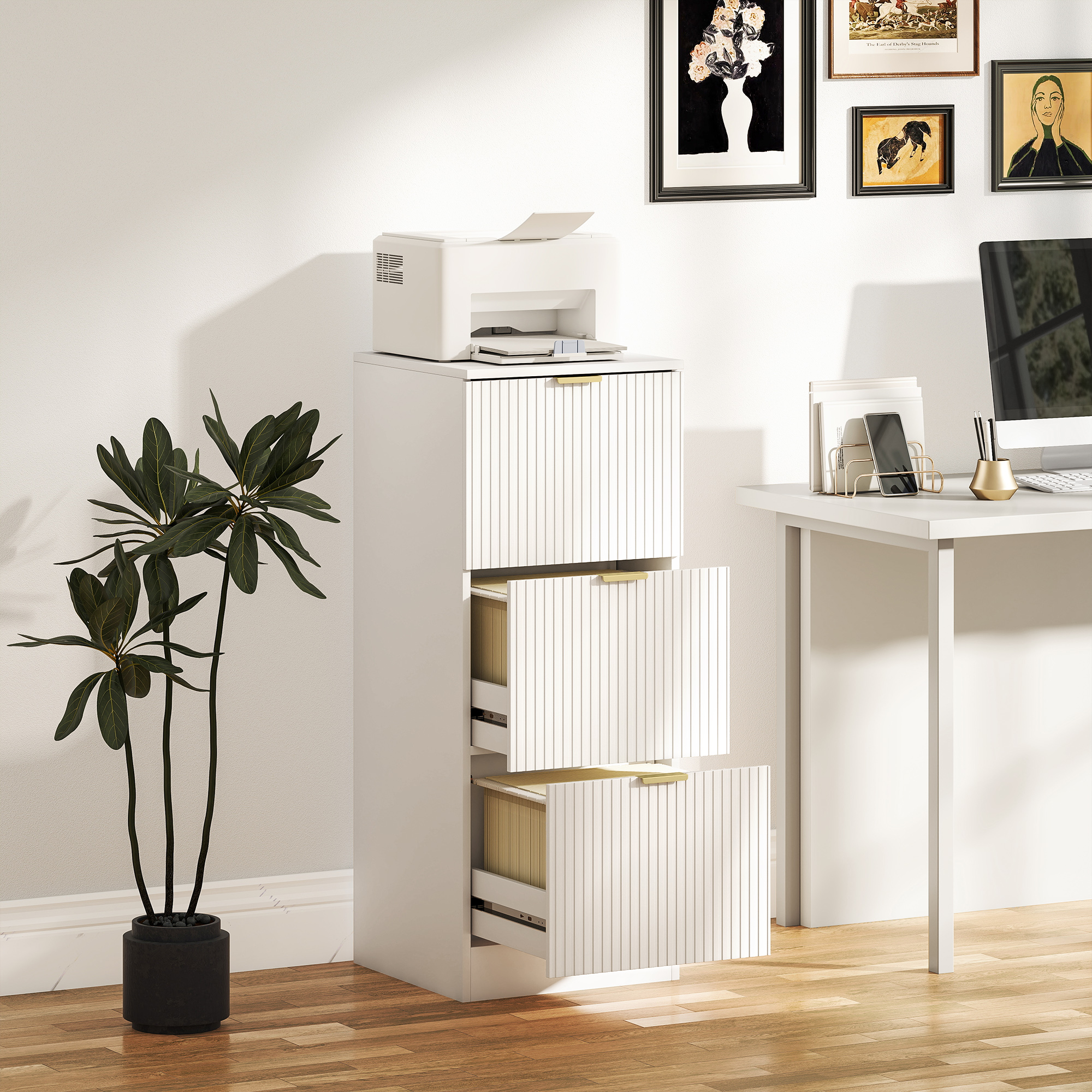 Un archivador blanco con impresora, planta y arte en la pared.