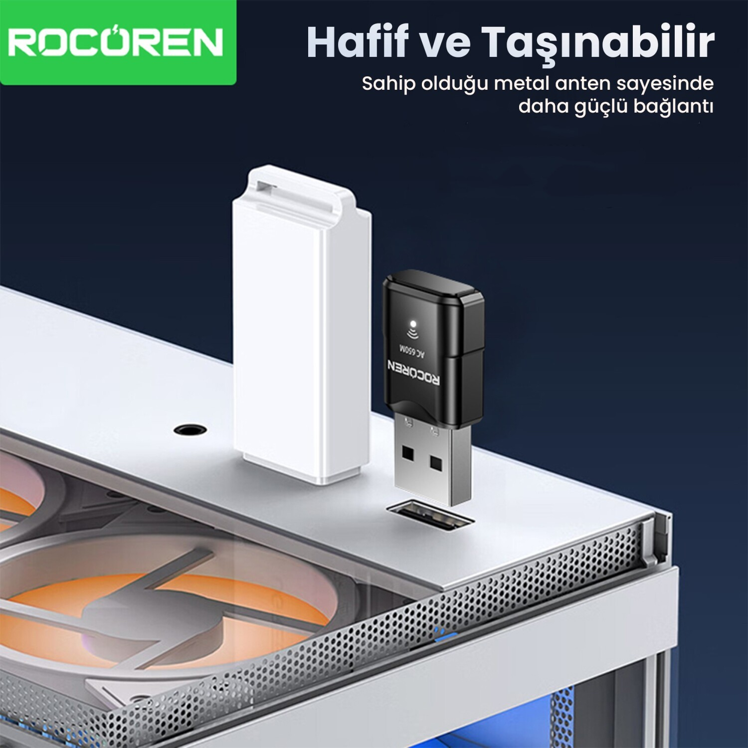 Beyaz bir kasan¢n¢n üzerinde siyah USB WiFi adaptörü ve beyaz taban.