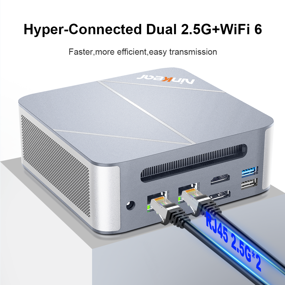 Un mini PC gris con cables RJ45 conectados a la parte trasera.