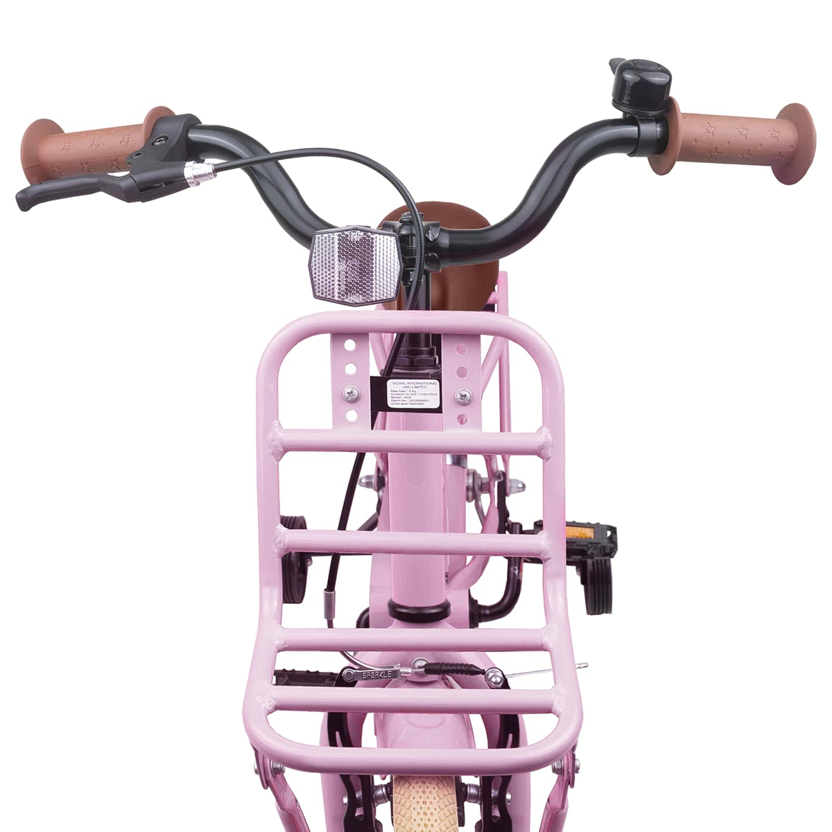 Rosa Fahrradlenker mit braunen Griffen, Klingel und Frontgepäckträger.