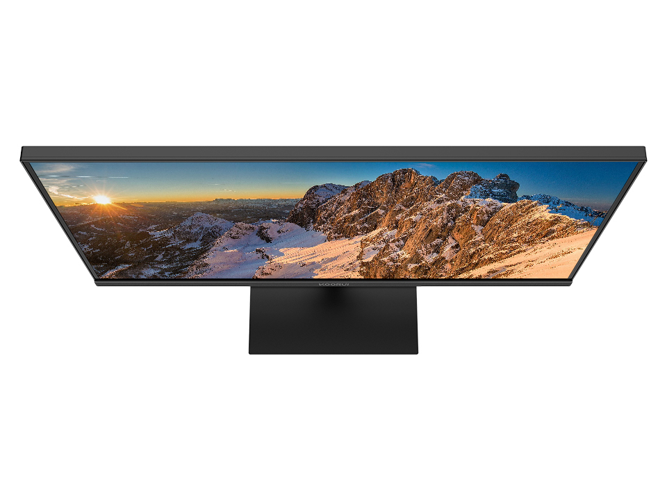 Un monitor nero che mostra un panorama montano all'alba.
