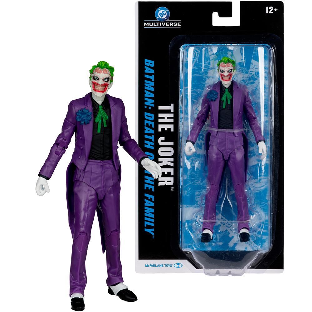 Un'action figure di Joker in abito viola, capelli verdi e guanti bianchi, accanto alla sua confezione su sfondo bianco.