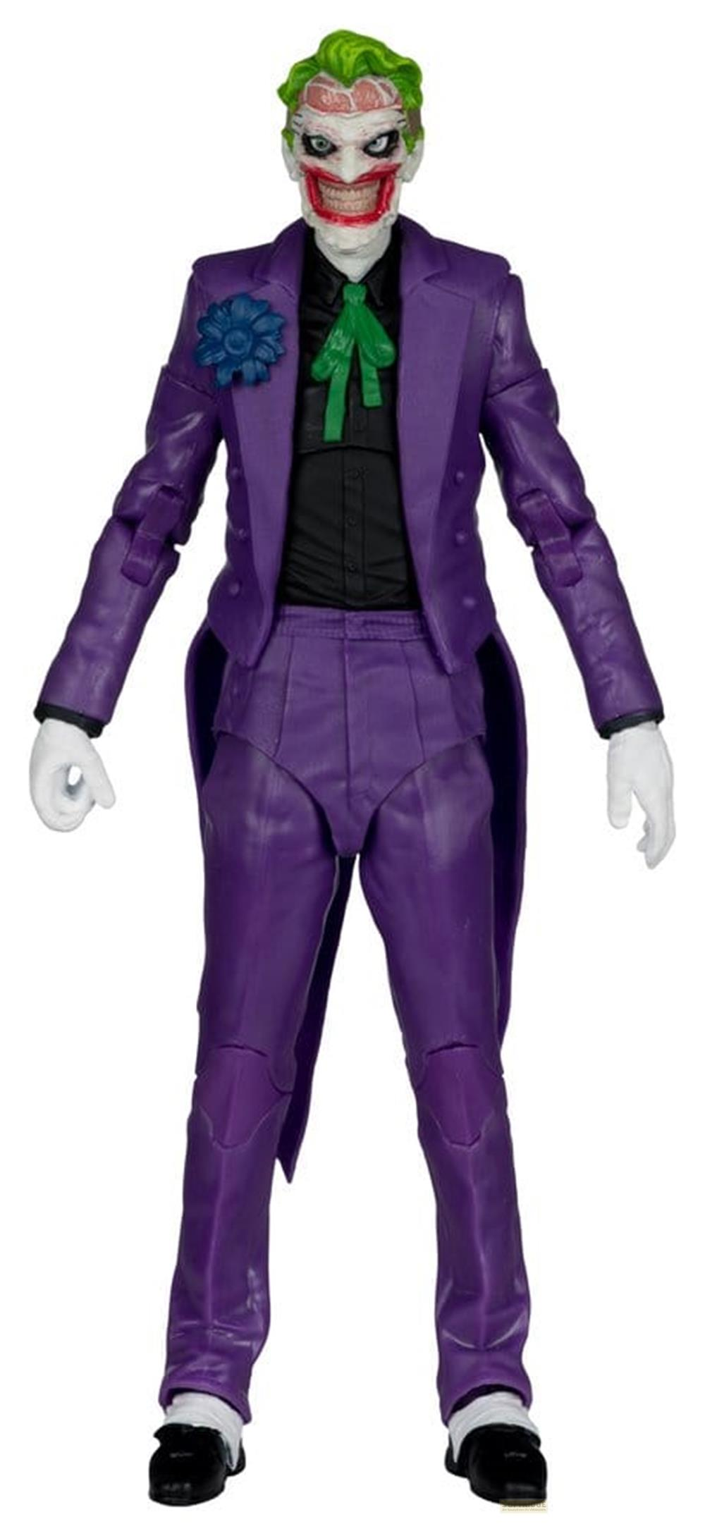 Action figure del Joker in abito viola con camicia e cravatta verdi.
