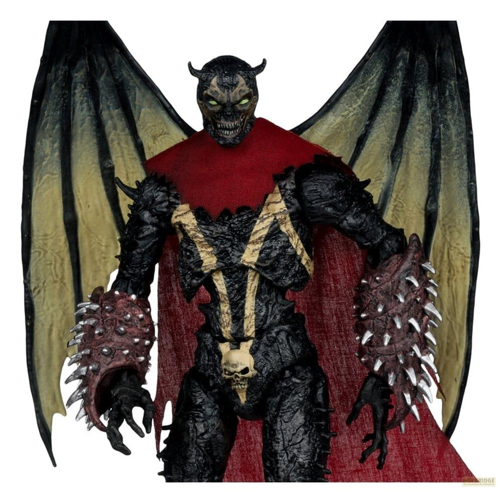 Action figure con ali nere, mantello rosso e braccia con spuntoni.