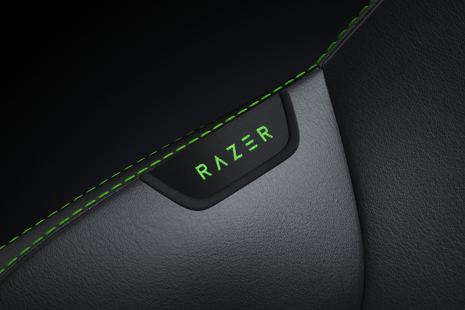 Costura y logo de Razer en cuero negro. Costura verde brillante.