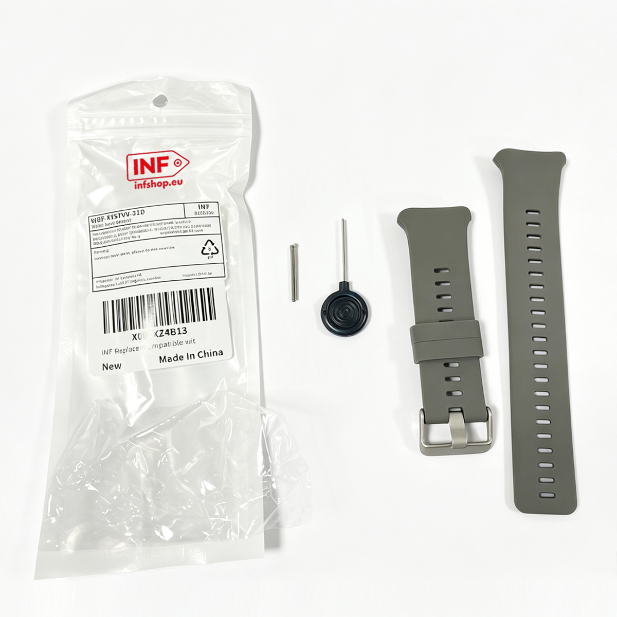 Graue Uhrenarmbänder mit Werkzeug und Ersatzteilen in transparenter Verpackung.