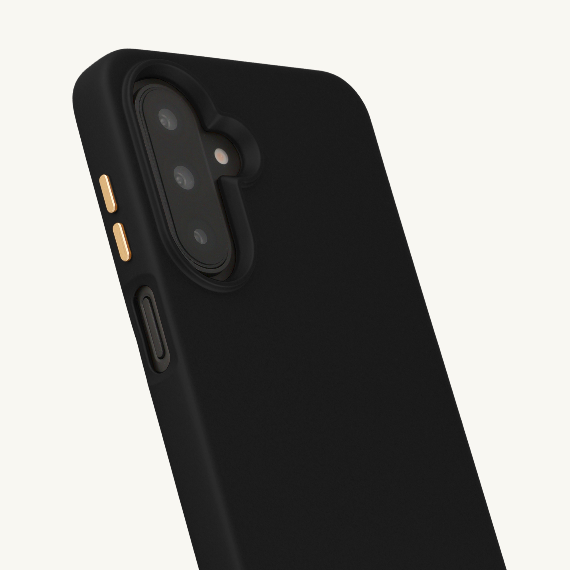 Zwarte telefoonhoes met gouden knop en cameramodule.