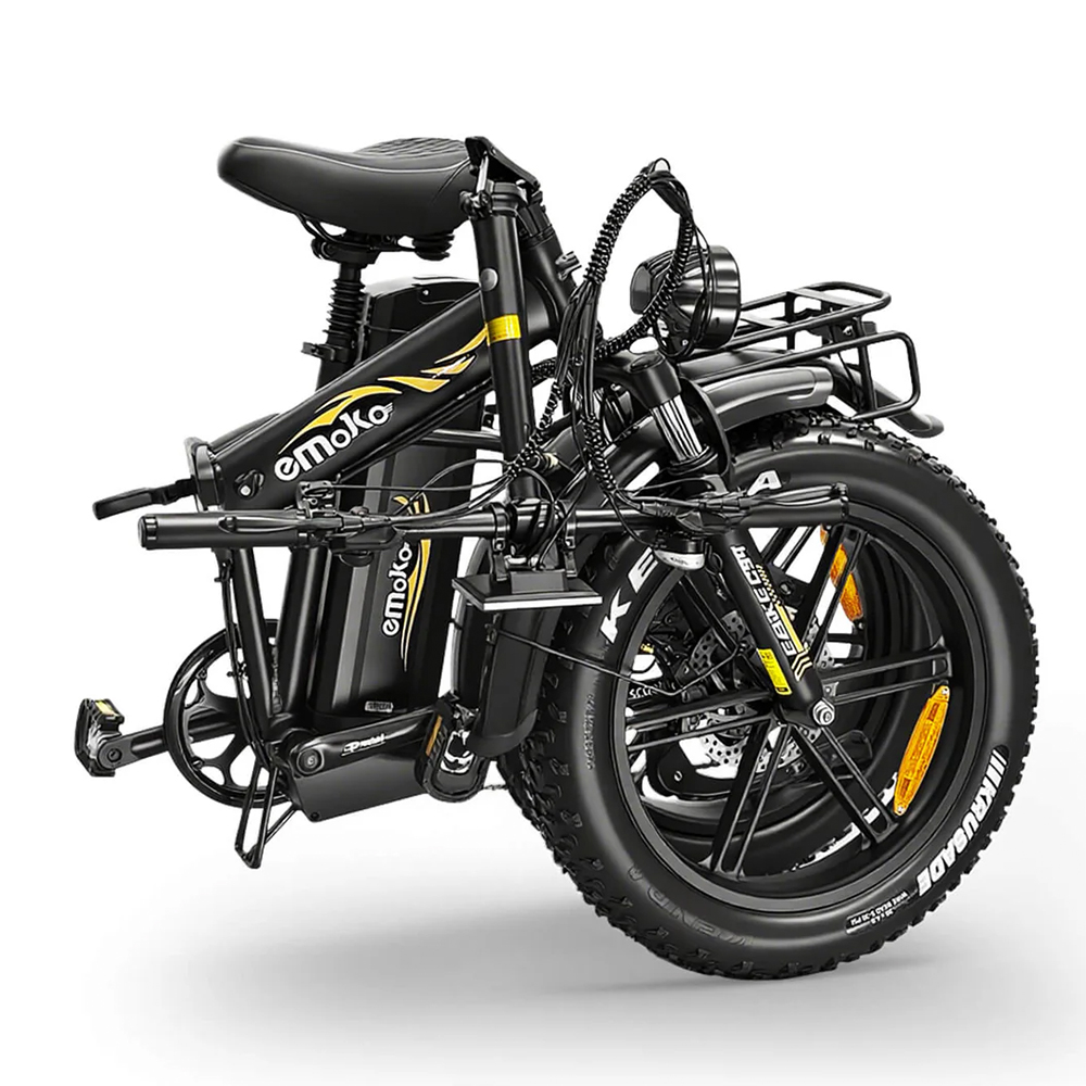 Bicicleta eléctrica plegable negra con ruedas anchas, logo amarillo y portabultos.