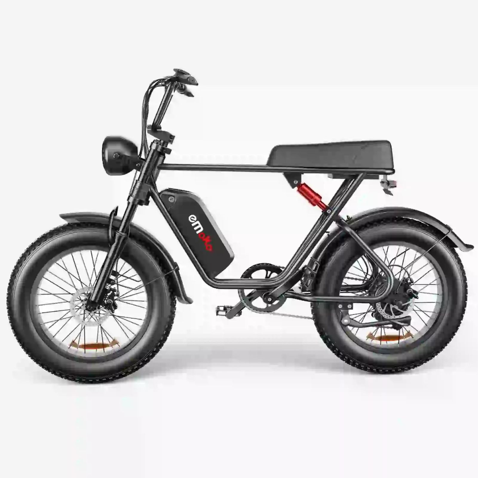 Bicicleta eléctrica negra con neumáticos anchos y amortiguador central.