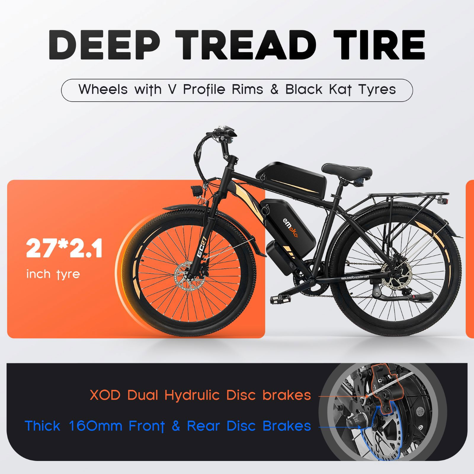 Bicicleta eléctrica negra con neumáticos de banda de rodadura profunda, doble batería y frenos de disco.