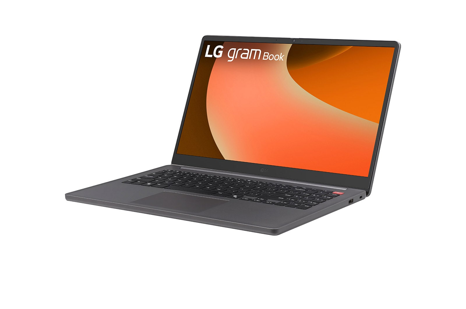Un laptop LG Gram grigio con tastiera retroilluminata e sfondo arancione.