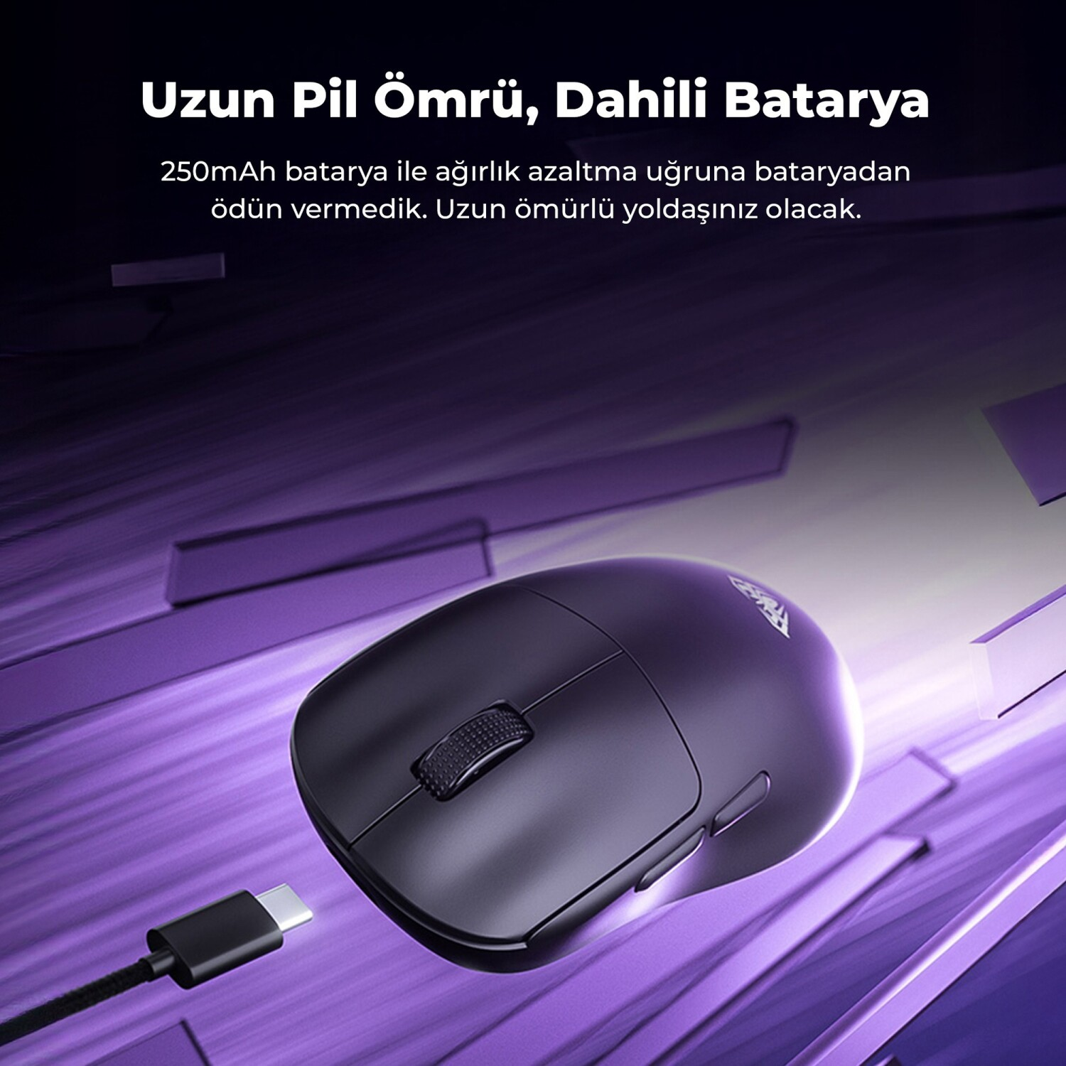 Mor arka plan üzerinde USB-C kablolu siyah fare, metin: Uzun pil ömrü.