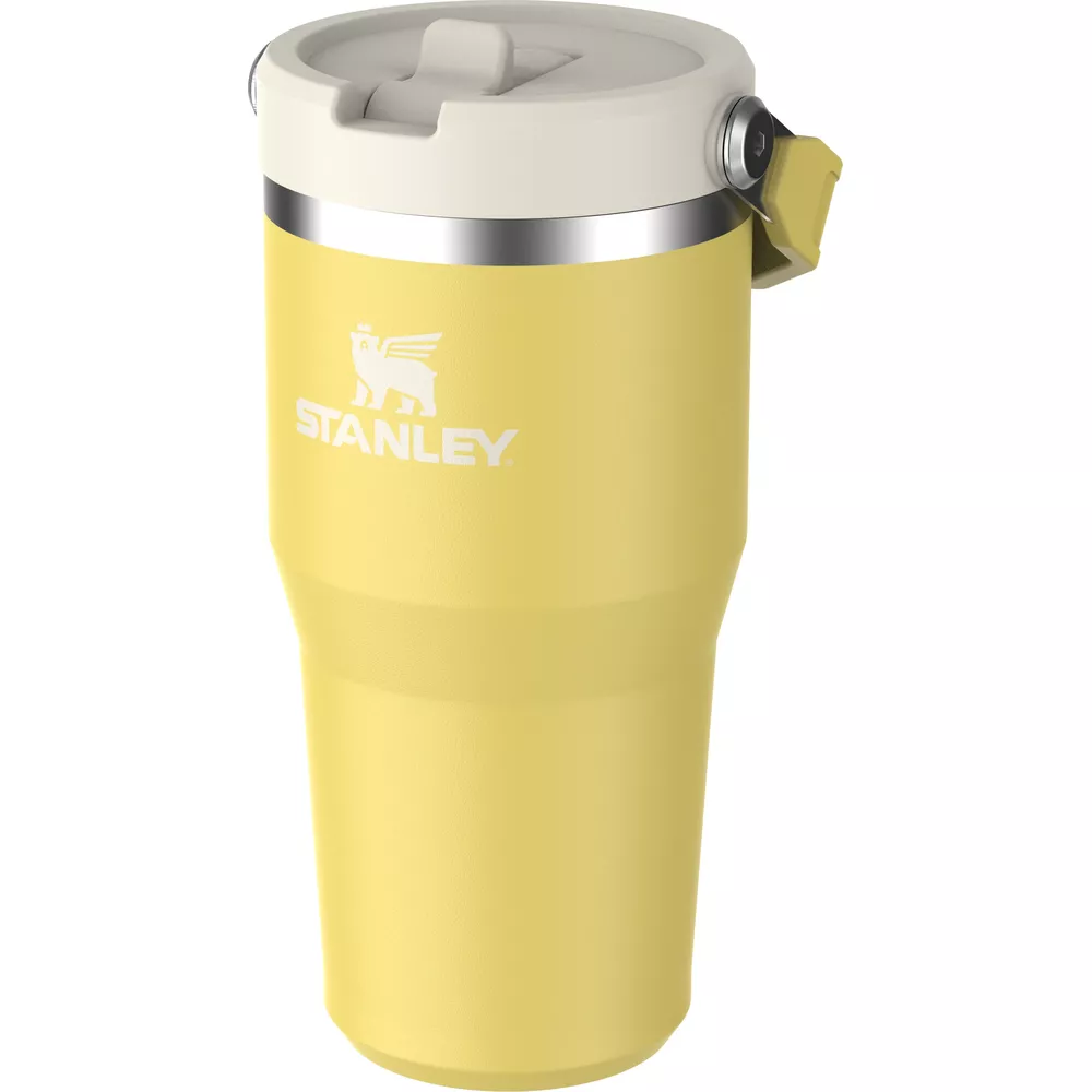 Üstte gümüş bantlı, beyaz kapaklı sarı Stanley matarası.