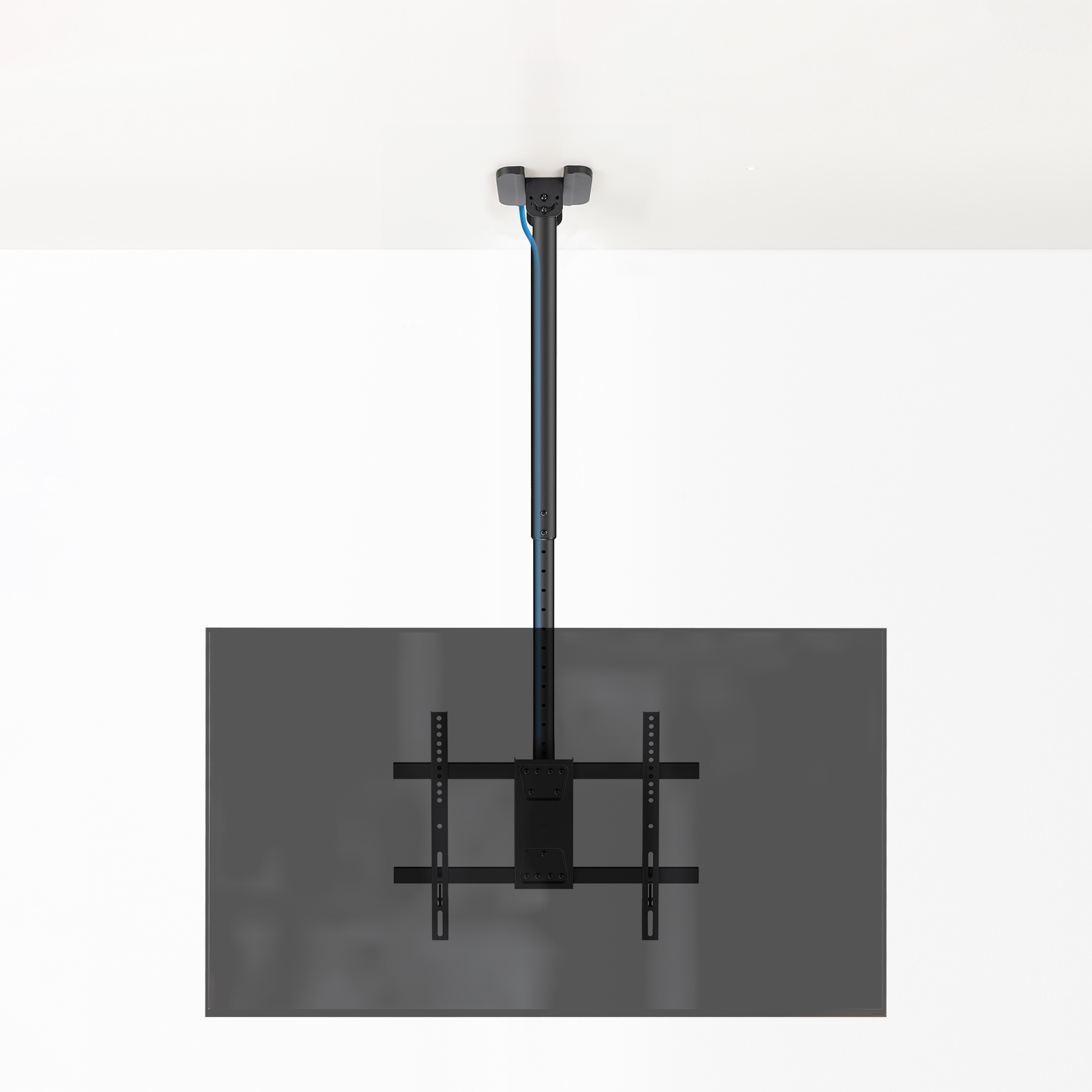 Supporto da soffitto nero per TV con cavo blu su soffitto bianco.