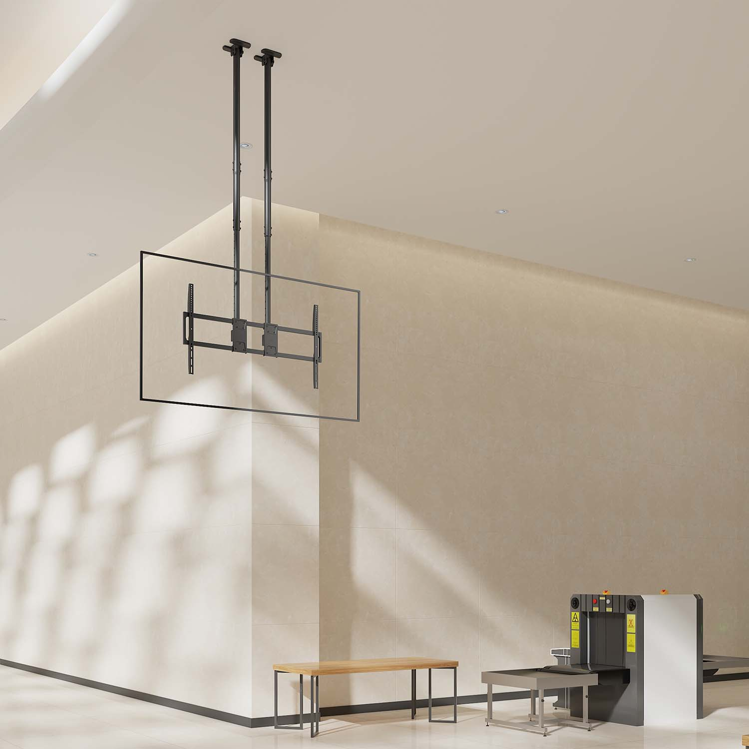 Un supporto TV scheletro è appeso al soffitto. Uno scanner a raggi X e una panchina sono nella stanza.