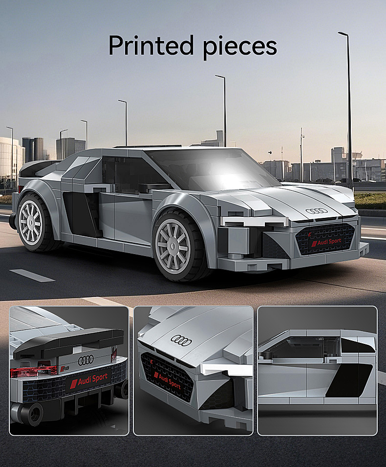 Graues Audi R8-Modell aus Klemmbausteinen mit "Audi Sport"-Aufdruck.