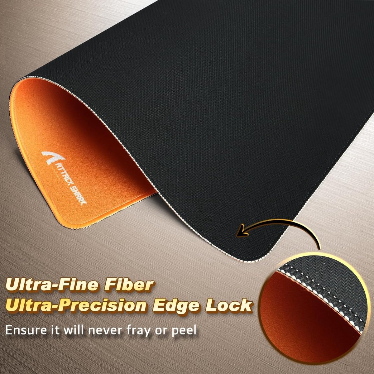 Black and orange mousepad with "Attack Shark" logo and close-up of edges.