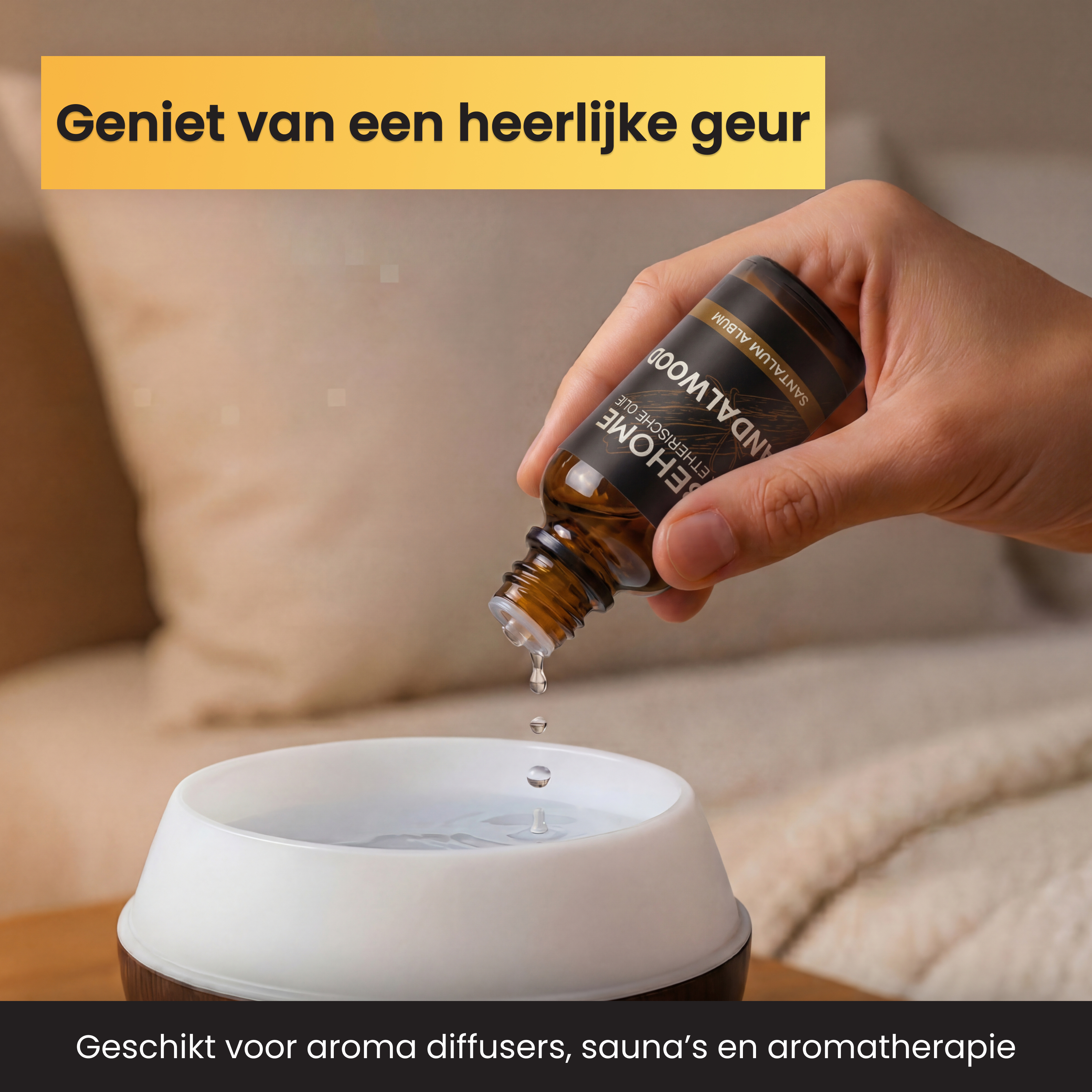 A hand drips sandalwood oil from a bottle into a diffuser.