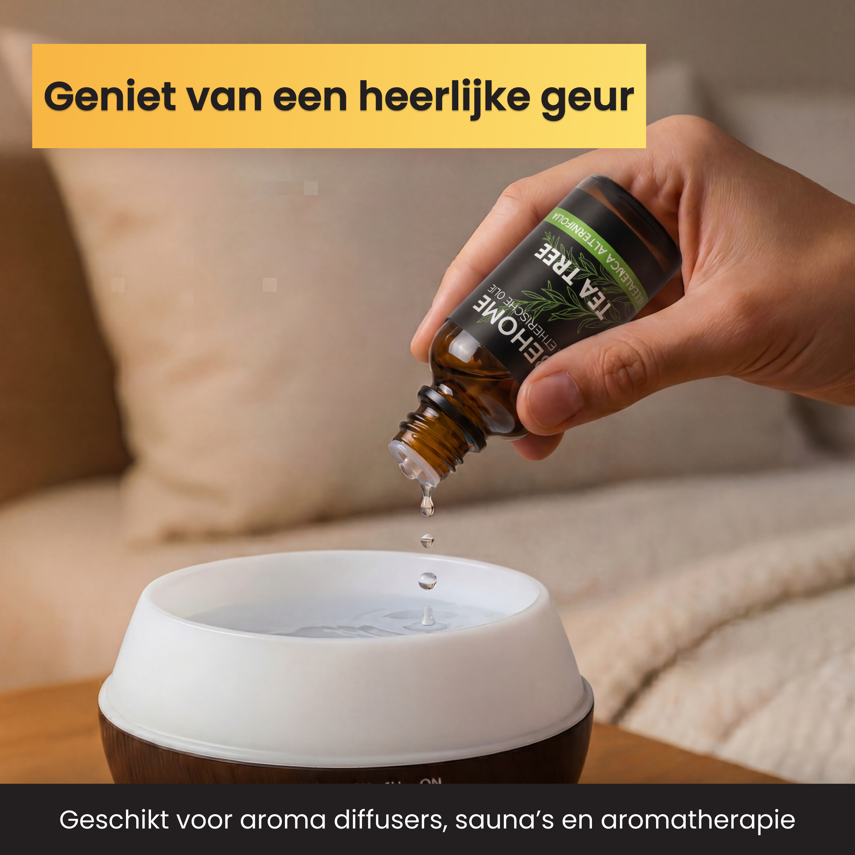 A hand drips tea tree oil from a brown bottle into a white diffuser.