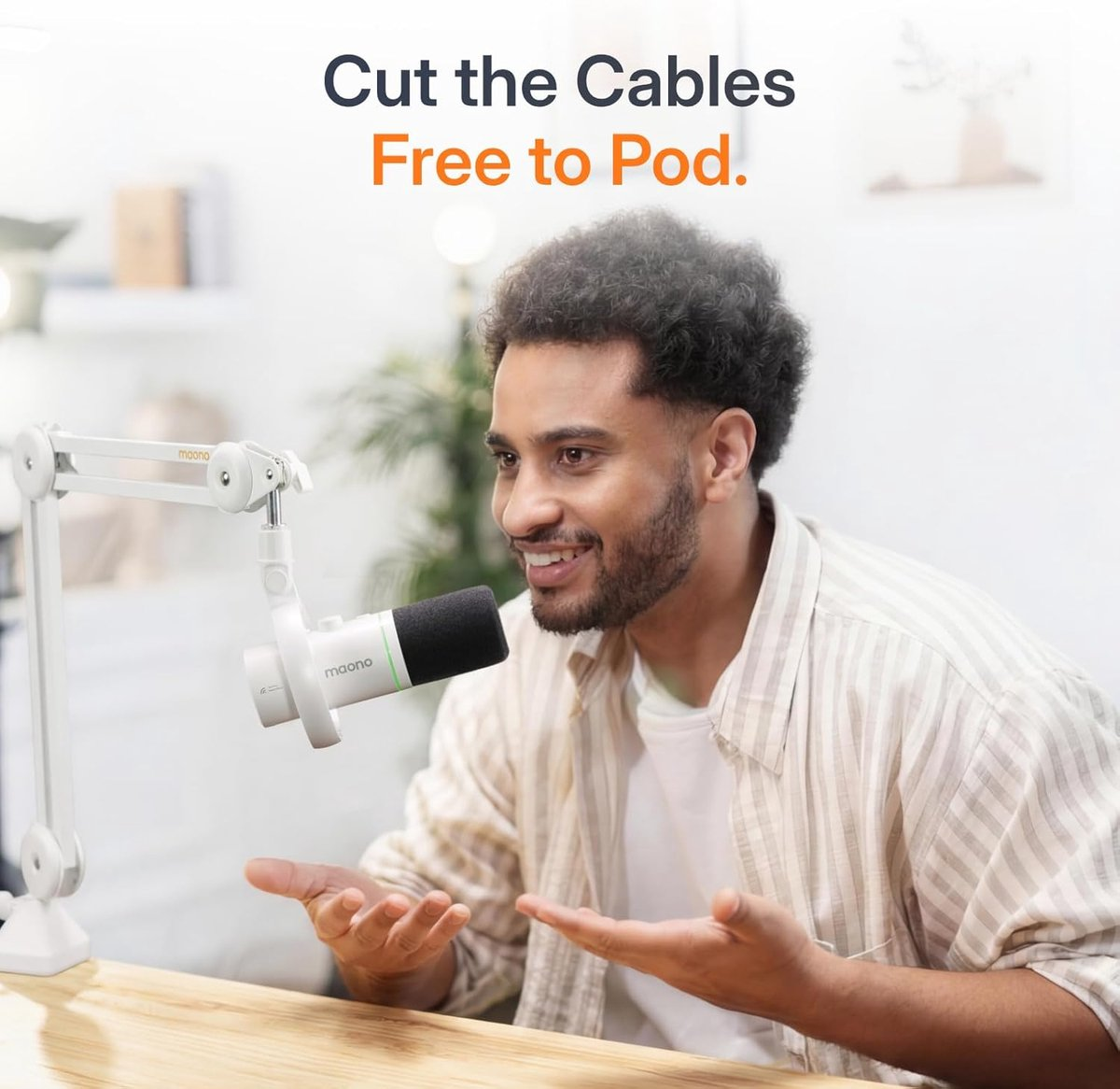 Man speaking into a white Maono microphone on a desk, with text 'Cut the Cables Free to Pod.'