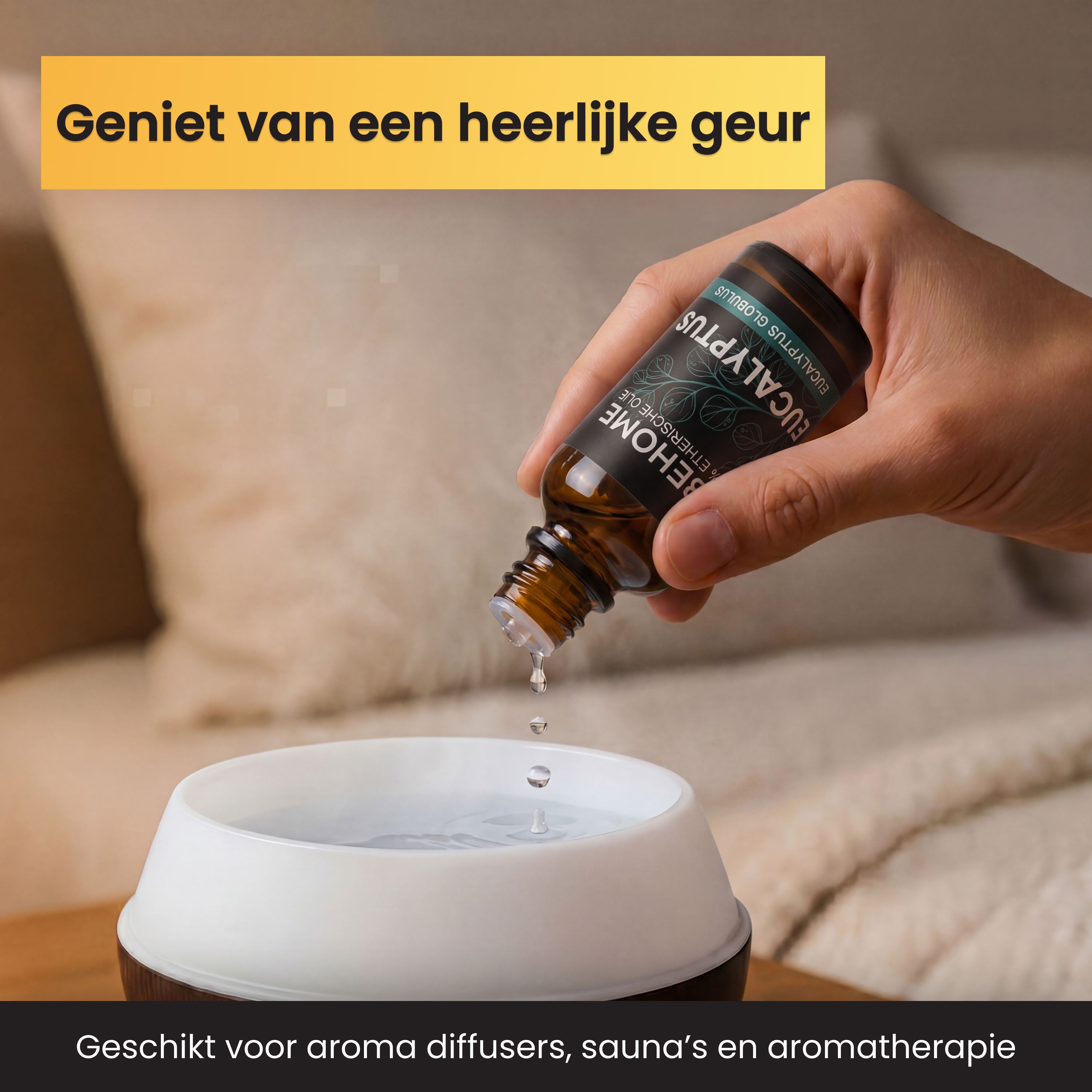A hand drips eucalyptus essential oil into a diffuser.